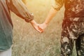 happy senior couple holding hands. hands of man and woman hold each other. romance and love and support in elderly family. faceles Royalty Free Stock Photo