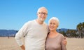 Happy senior couple hugging over venice beach Royalty Free Stock Photo