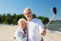 Happy senior couple hugging on summer beach Royalty Free Stock Photo