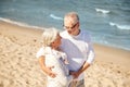 Happy senior couple hugging on summer beach Royalty Free Stock Photo