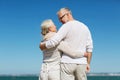 Happy senior couple hugging on summer beach Royalty Free Stock Photo