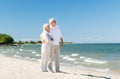 Happy senior couple hugging on summer beach Royalty Free Stock Photo