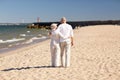 Happy senior couple hugging on summer beach Royalty Free Stock Photo