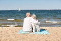 Happy senior couple hugging on summer beach Royalty Free Stock Photo