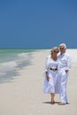 Happy Senior Couple Laughing on Tropical Beach Royalty Free Stock Photo