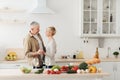 Happy senior couple in love celebrating Valentines day at home together, having romantic dinner Royalty Free Stock Photo