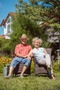 Happy senior couple in love relaxing together in the garden Royalty Free Stock Photo