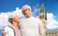 Happy senior couple over big ben tower in london Royalty Free Stock Photo
