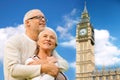 Happy senior couple over big ben tower in london Royalty Free Stock Photo