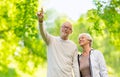 Happy senior couple over green natural background Royalty Free Stock Photo