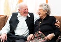 Happy senior couple posing close together Royalty Free Stock Photo