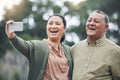 Happy senior couple, selfie and laughing for photo, picture or memory together in nature outdoors. Elderly man and woman Royalty Free Stock Photo