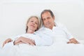 Happy Senior Couple On Sleeping Bed Royalty Free Stock Photo