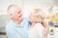 Happy senior couple smiling while looking at eachother Royalty Free Stock Photo