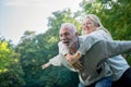 Happy senior couple smiling outdoors in nature Royalty Free Stock Photo