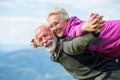 Happy senior couple smiling outdoors in nature. Grandparents, autumn. Royalty Free Stock Photo