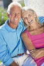 Happy Senior Couple Smiling Outside in Sunshine