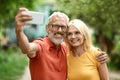 Happy Senior Couple Taking Selfie On Smartphone Outdoors Royalty Free Stock Photo