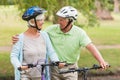 Happy senior couple on their bike Royalty Free Stock Photo