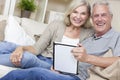 Happy Senior Couple Using Tablet Computer