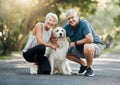 Happy senior couple, walking dog in nature park and smile bonding with their golden retriever together. Healthy living Royalty Free Stock Photo