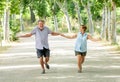 Happy senior couple walking and enjoying life outdoors Royalty Free Stock Photo