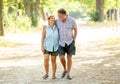 Happy senior couple walking and enjoying life outdoors Royalty Free Stock Photo