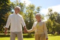 Happy senior couple walking at summer city park Royalty Free Stock Photo