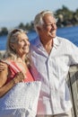 Happy Senior Couple Walking Tropical Sea or River Royalty Free Stock Photo