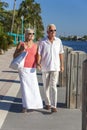Happy Senior Couple Walking Tropical Sea or River Royalty Free Stock Photo