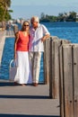 Happy Senior Couple Walking Tropical Sea or River Royalty Free Stock Photo