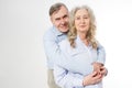 Happy senior family couple on white background. Close up portrait woman and man with wrinkled face. Elderly grandparents