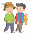 Happy senior father talking to his son while fishing