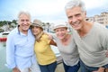 Happy senior friends on a visiting tour trip Royalty Free Stock Photo