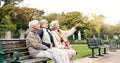 Happy, senior friends and walking together on an outdoor path or relax in nature with elderly women in retirement Royalty Free Stock Photo