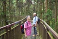 Happy senior hiking in the park