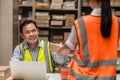 Happy senior male engineer director worker working sending box for products inventory shipping distribution Royalty Free Stock Photo