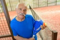 Happy senior male tennis player indoors Royalty Free Stock Photo