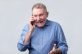 Happy senior man talking on the phone Royalty Free Stock Photo