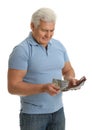 Happy senior man with cash money and wallet on white background Royalty Free Stock Photo