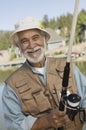 Happy Senior Man Fishing Royalty Free Stock Photo