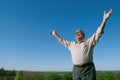 Happy senior man rejoicing in nature