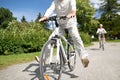 Happy senior man riding bicycle at summer park Royalty Free Stock Photo