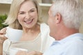 Happy Senior Man & Woman Couple Drinking