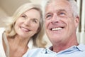 Happy Senior Man & Woman Couple Smiling at Home Royalty Free Stock Photo