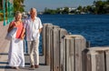 Happy Senior Man Woman Couple Walking Tropical Sea or River Royalty Free Stock Photo