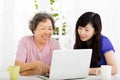 Happy senior Mother and daughter learning laptop Royalty Free Stock Photo