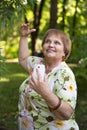 Happy senior pensioner having fun with mobile and headphones