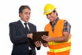 Happy senior Persian businessman and young Persian man construct Royalty Free Stock Photo