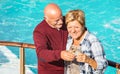Happy senior retired couple having fun outdoors at travel vacation Royalty Free Stock Photo